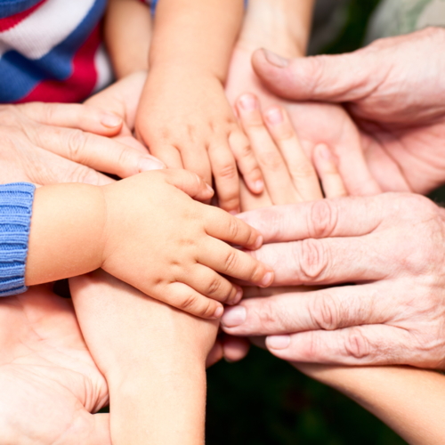 Family-holding-hands-together1440