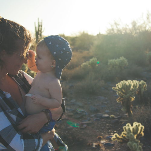 Baby and mum at sunset