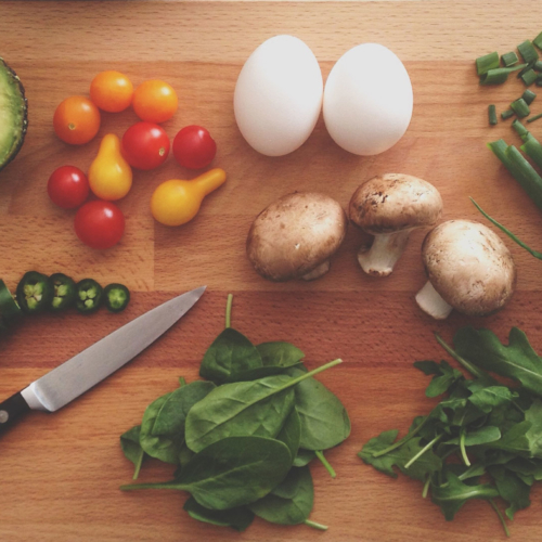 Chopping board with fresh vegetable