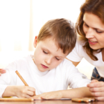 Mum-helping-son-with-homework1440