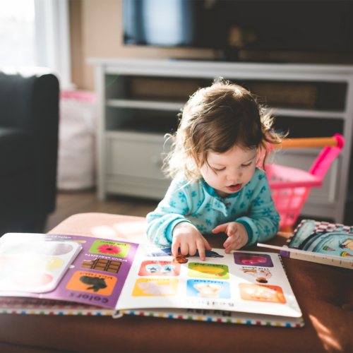 toddler-withbook-on-table2160