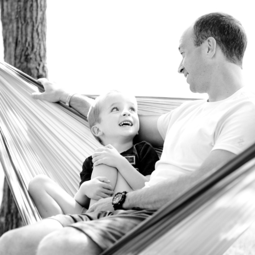 father-son-hammock-chatting-mono2160