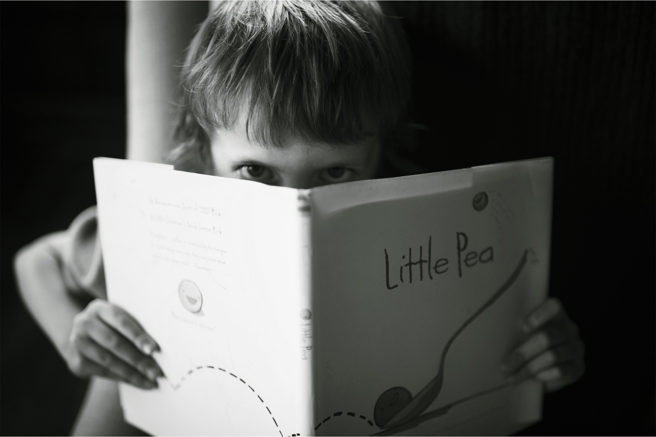 child-reading-book-mono2160