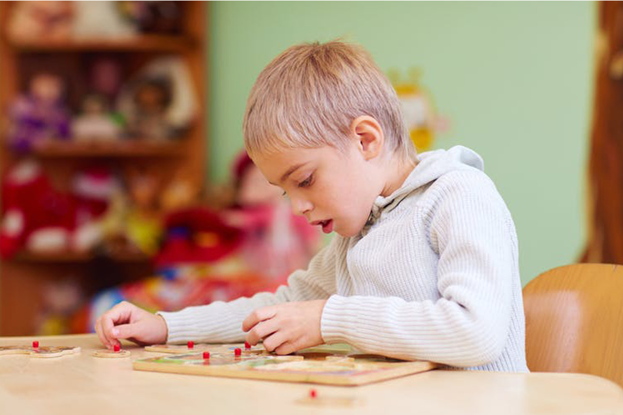NDIS boy with puzzle