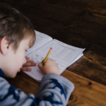 boy-writing-maths-homework2160