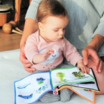 child-mum-reading-cloth-book2160