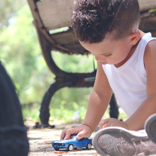 toddler-playing-with-toy-car2160