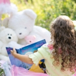 girl-reading-book-toys2160