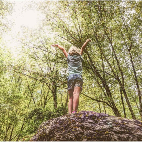 girl-on-rock-outside2160