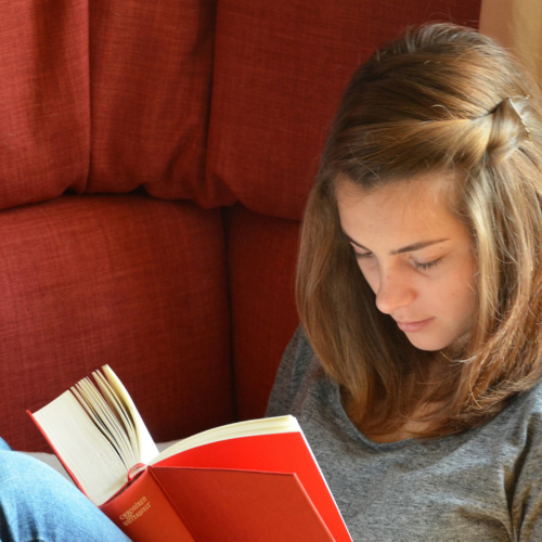 teen-reading-on-couch2160