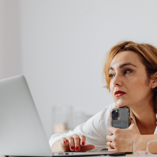 thoughtful-woman-on-laptop2160