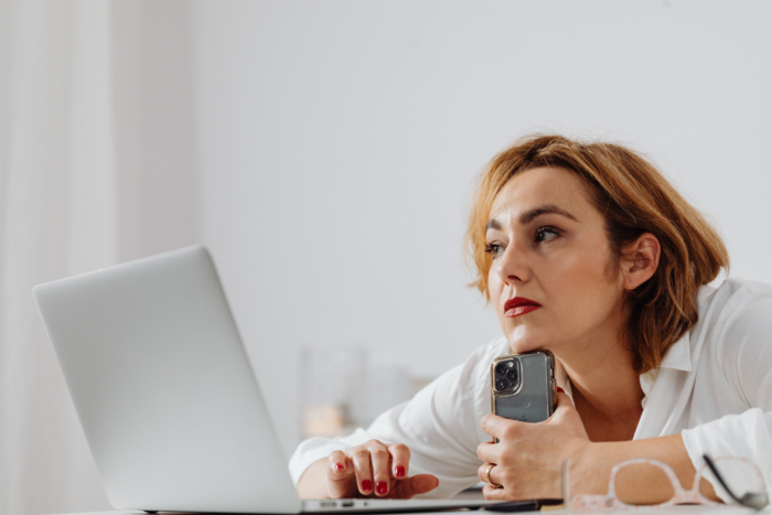 thoughtful-woman-on-laptop2160