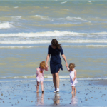 mother-two-girls-on-beach2160