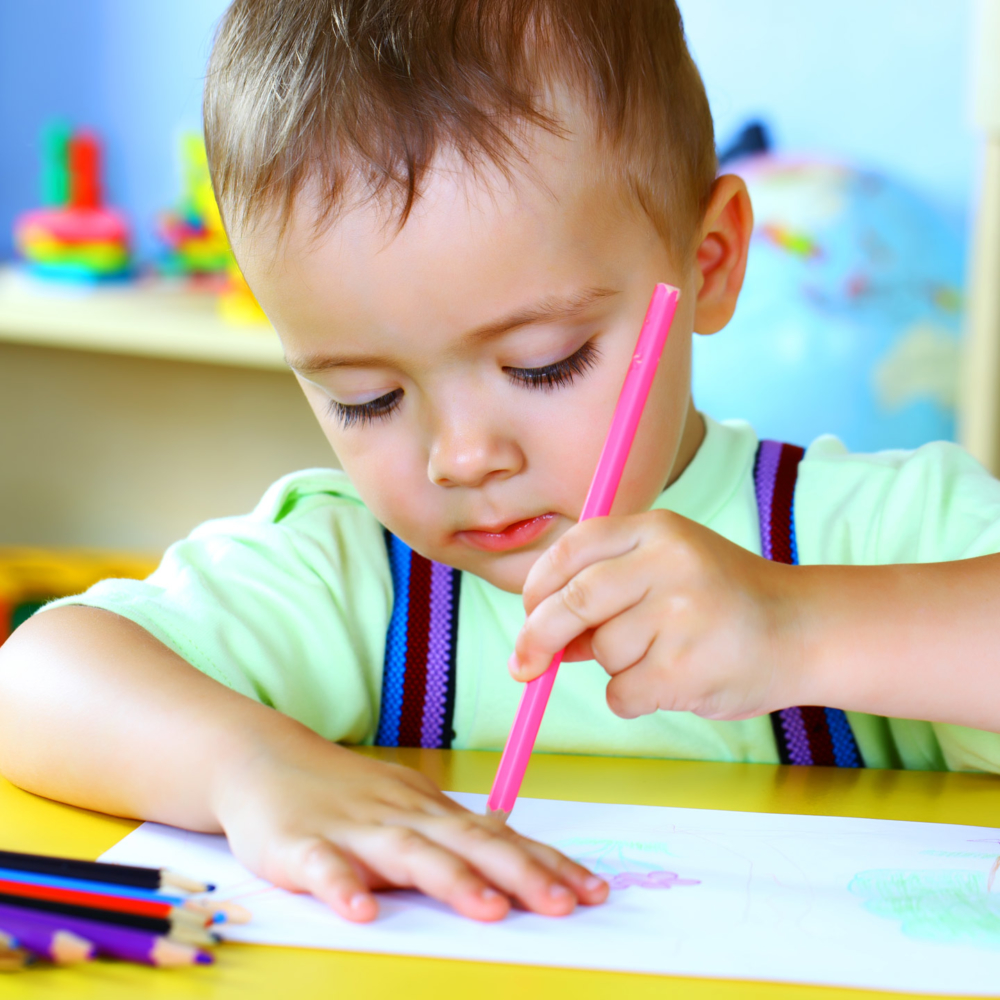 Boy drawing colorful