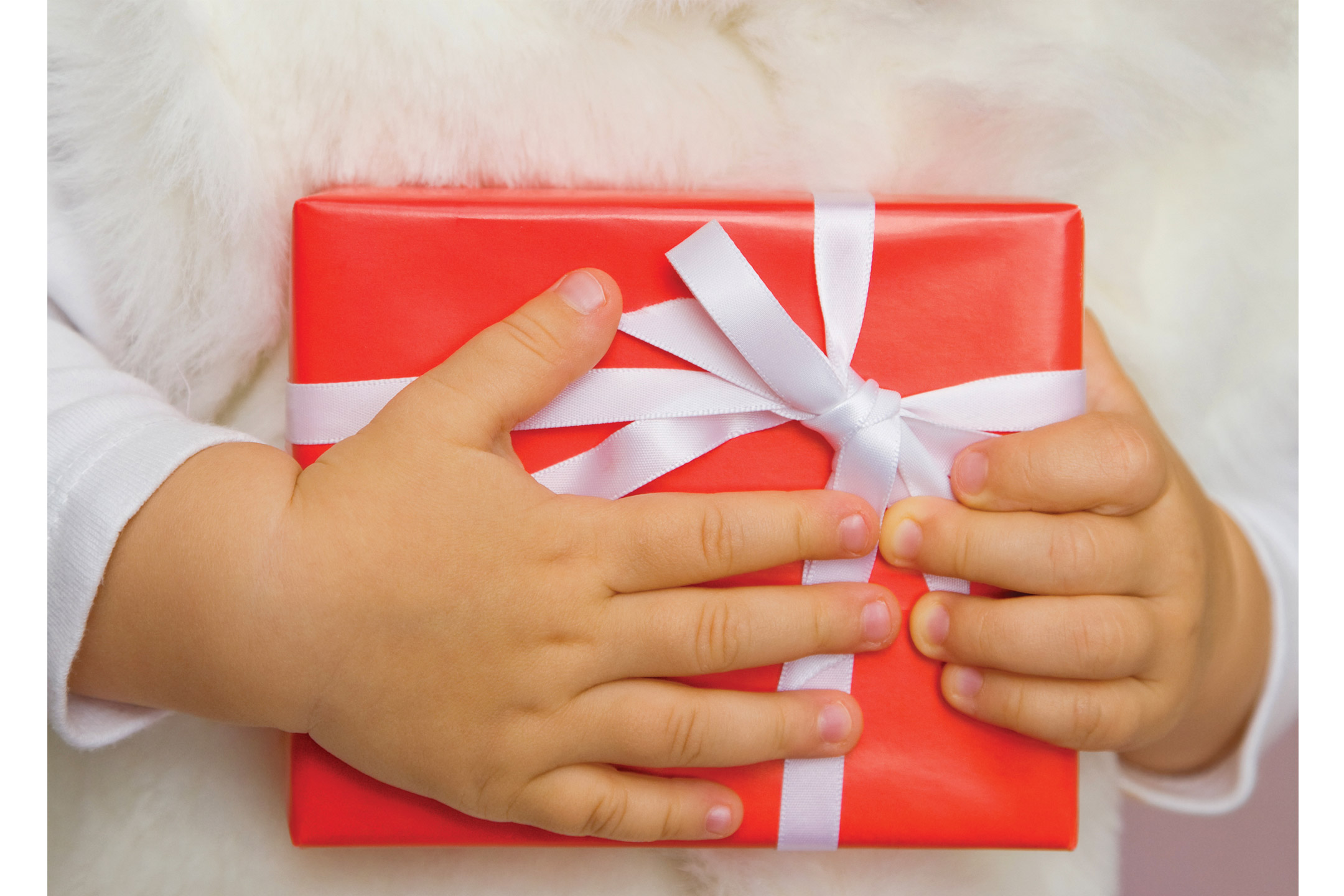 red-gift-clutched-by-child2160