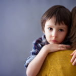 sad-little-boy-hugging-mother2160