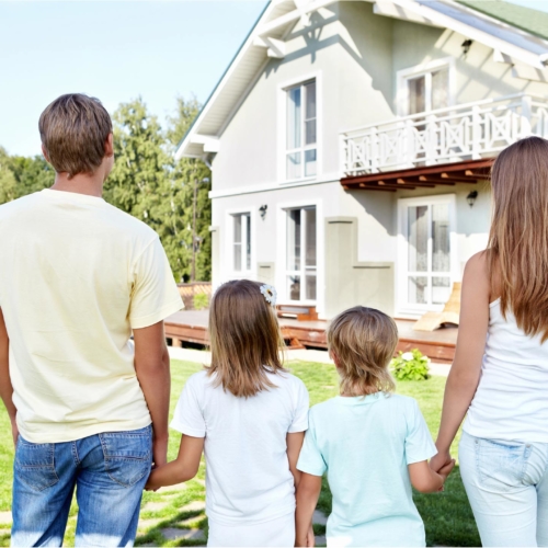 family-looking-at-house2160