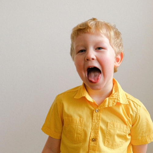 young-boy-tongue-out