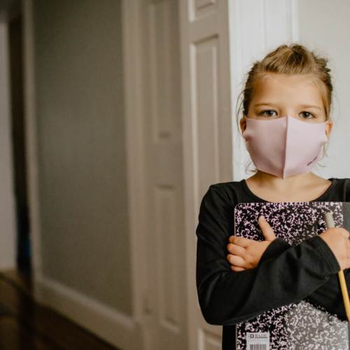 girl-masked-holding-sketch-book