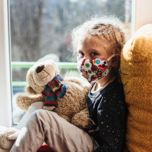 sad-child-with-mask-and-teddy2160