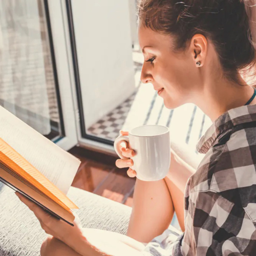 woman-in-cozy-reading-corner