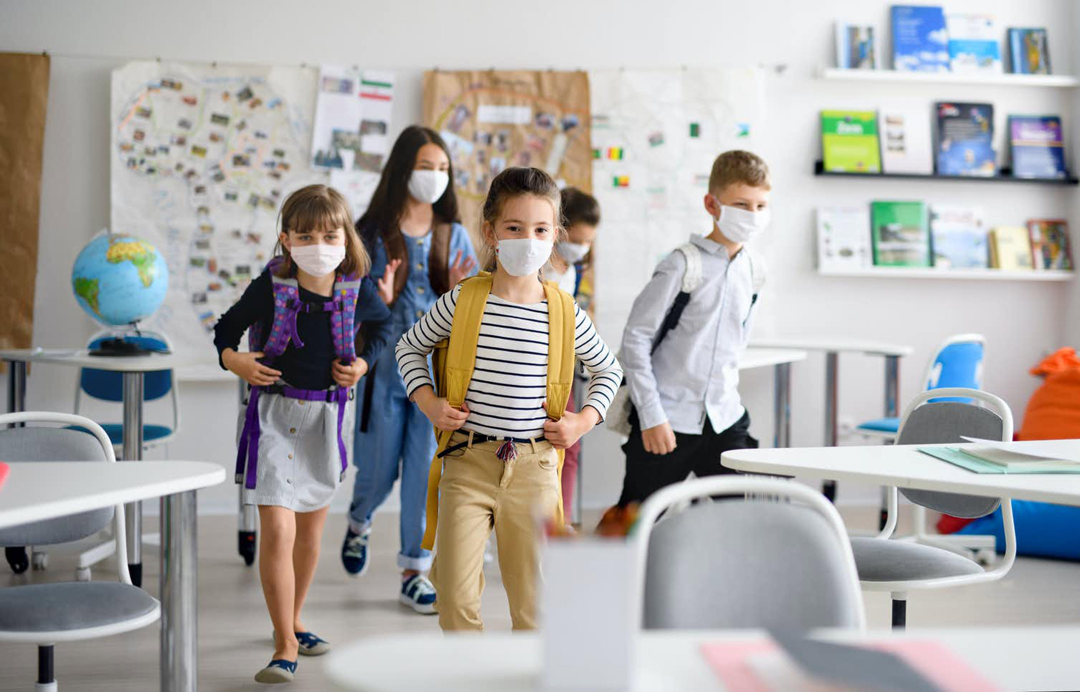 school-kids-entering-classroom-with-masks