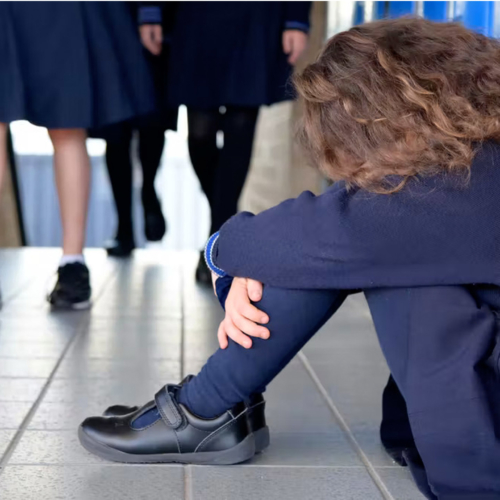 sad-child-in-uniform-at-school2160