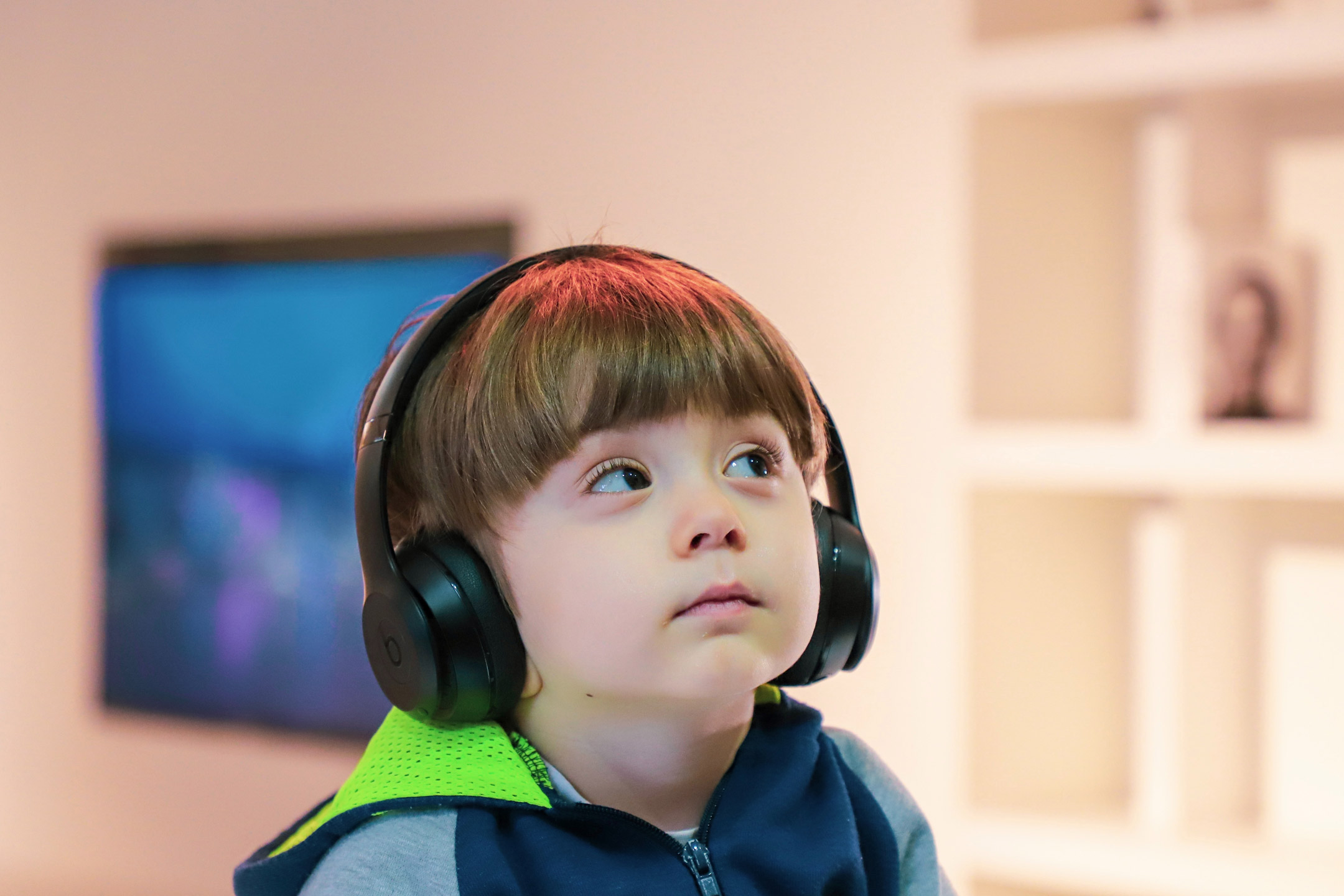 young boy with earphones