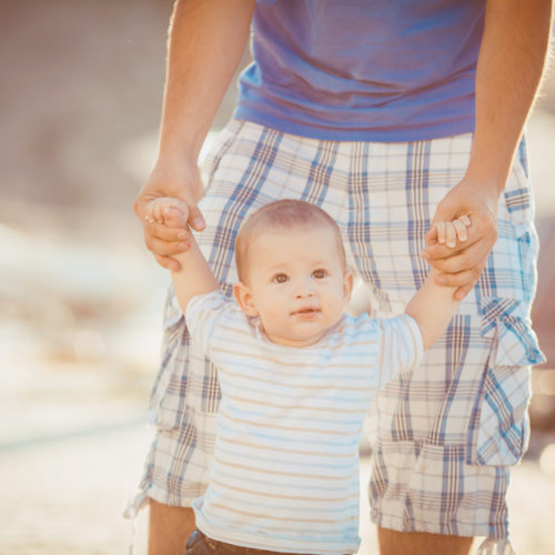 cute toddler learning to walk